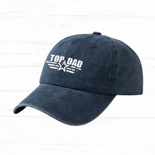 Navy blue cap with 'Top Dad' text on a white background