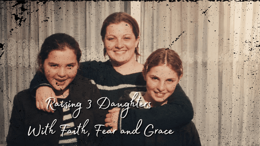 Nostalgic family photo of three daughters smiling together, used for a heartfelt blog about motherhood, faith, and raising girls.