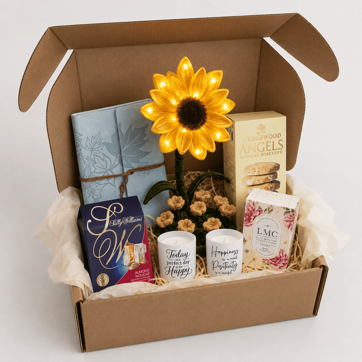 Hand Packed Self-care gift box for her with journal, sunflower lamp, tea, nougat and candles — Purely Euphoria South Africa