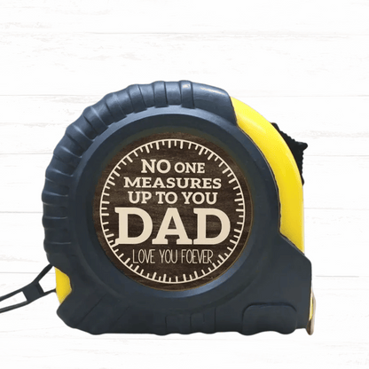Tape measure with a personalized message on a white background - No one measures up to you DAD Love you forver