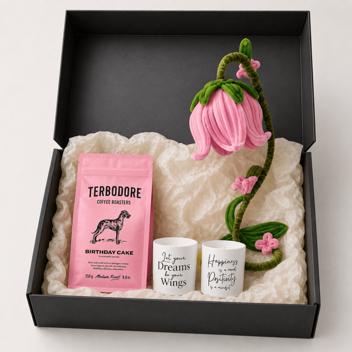 Birthday gift set for her with Terbodore Birthday Cake coffee, quote candles and handmade pink tulip lamp in a black gift box.