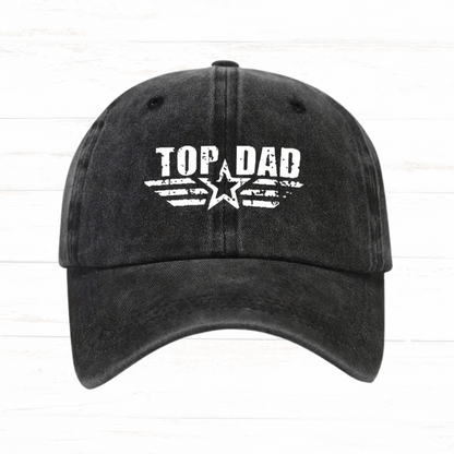 Black cap with 'Top Dad' text and star design on a white background
